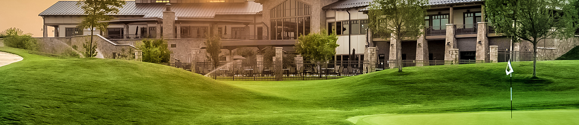 Image of golf ball on tee on grass.